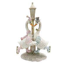 Dekorativní figurka kachního páru na bruslích